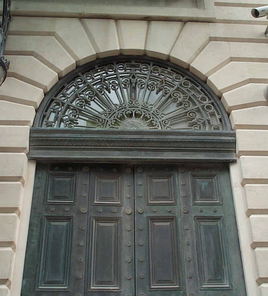 Bronze Bifolding door with fanlight and cast transom